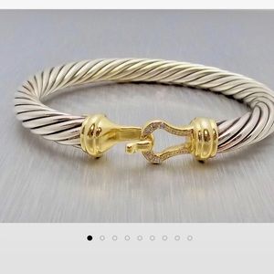 Sterling silver with 18 K gold buckle  & diamonds